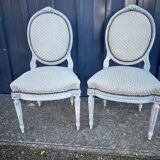 Pair of lacquered Louis XVI style chairs