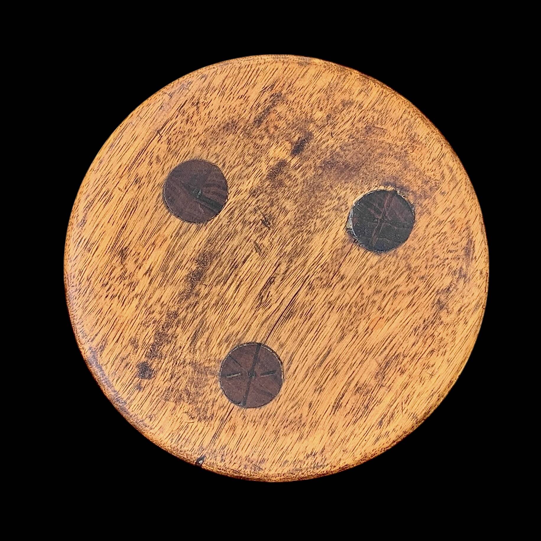 Old small wooden tripod stool