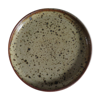 Round dish in varnished sandstone