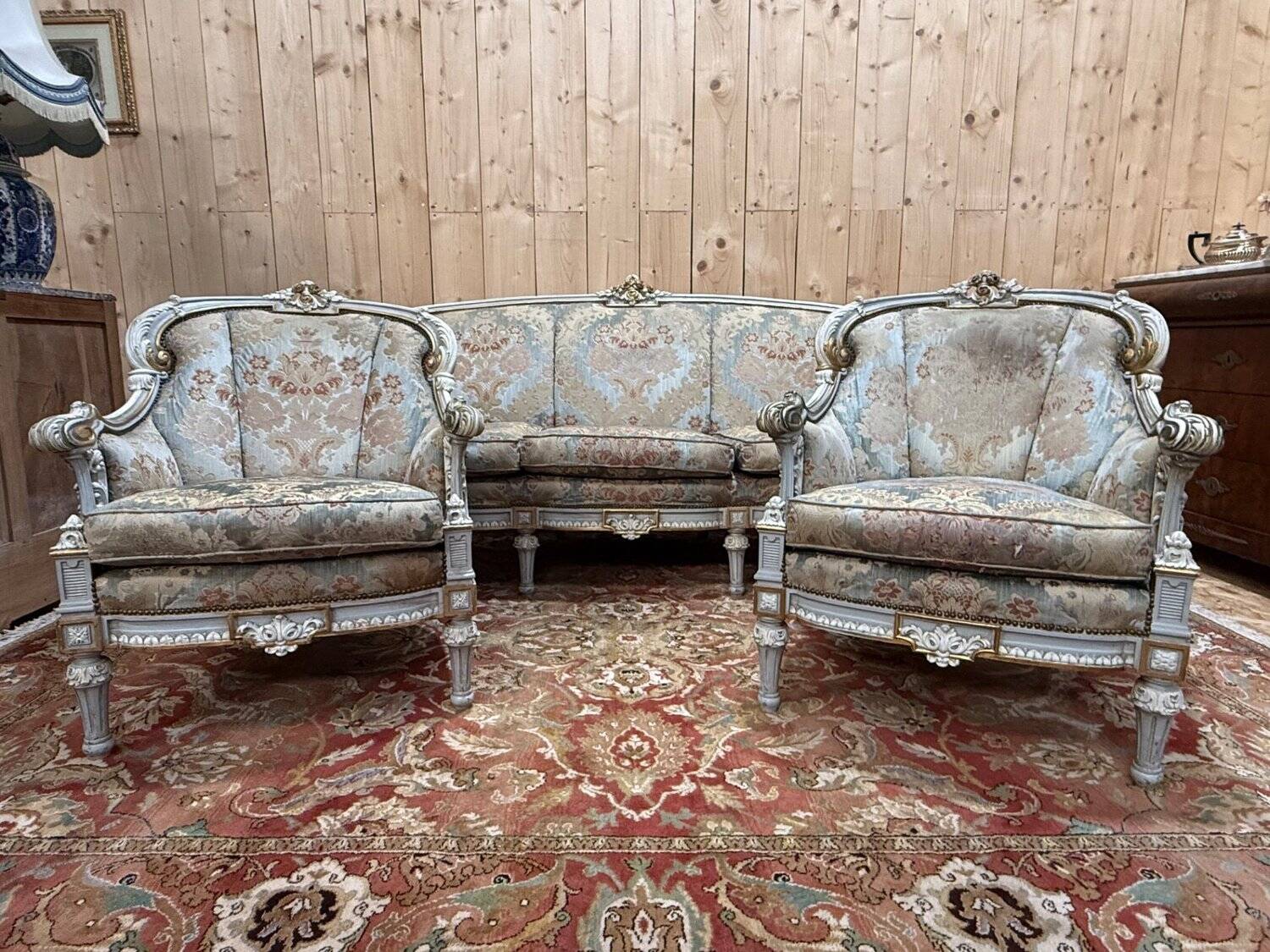 Louis XV salon in reclaimed wood, three-seater sofa and two armchairs.