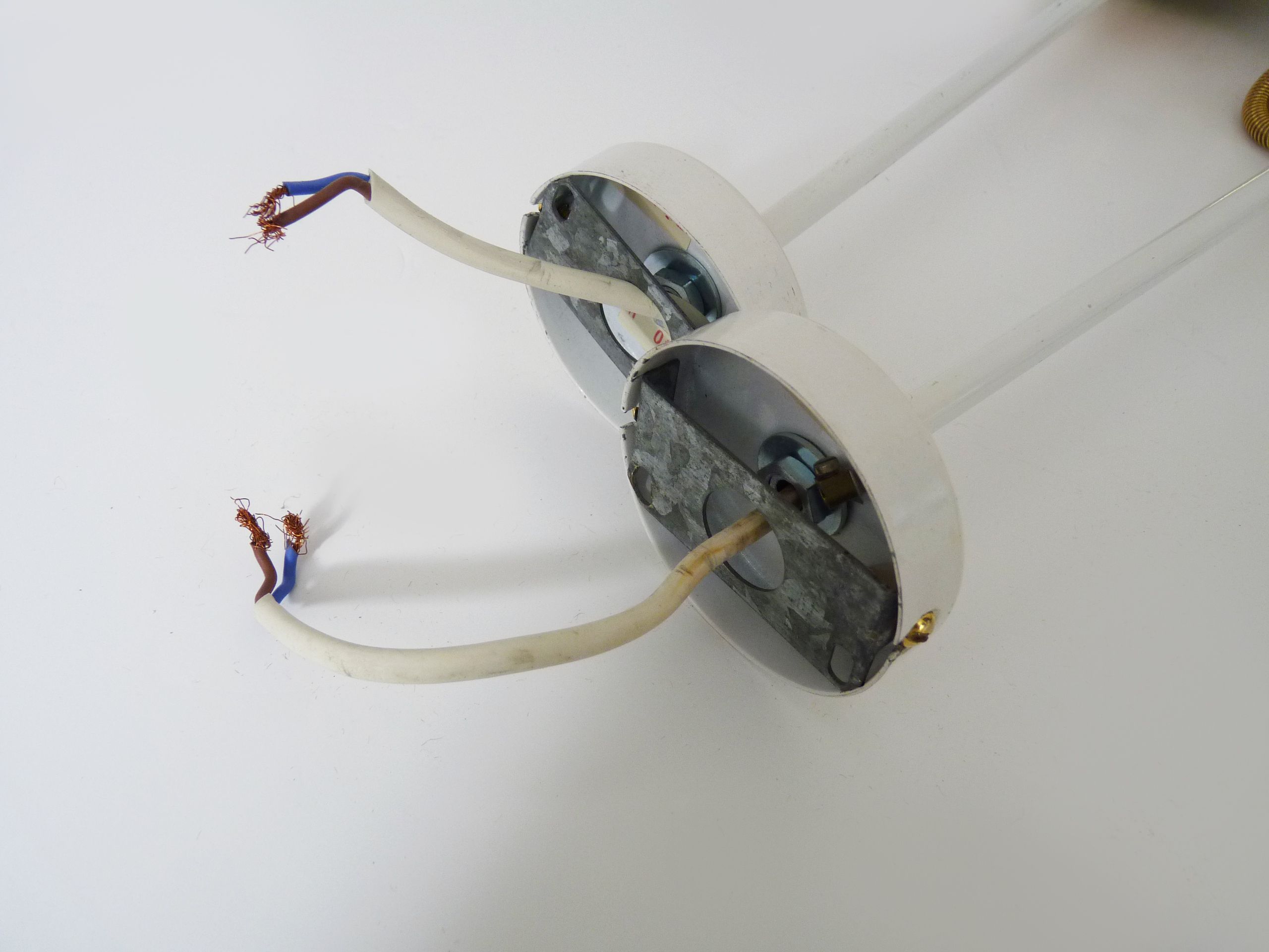 Pair of spot wall lamps adjustable design in white metal and brass. Year 80