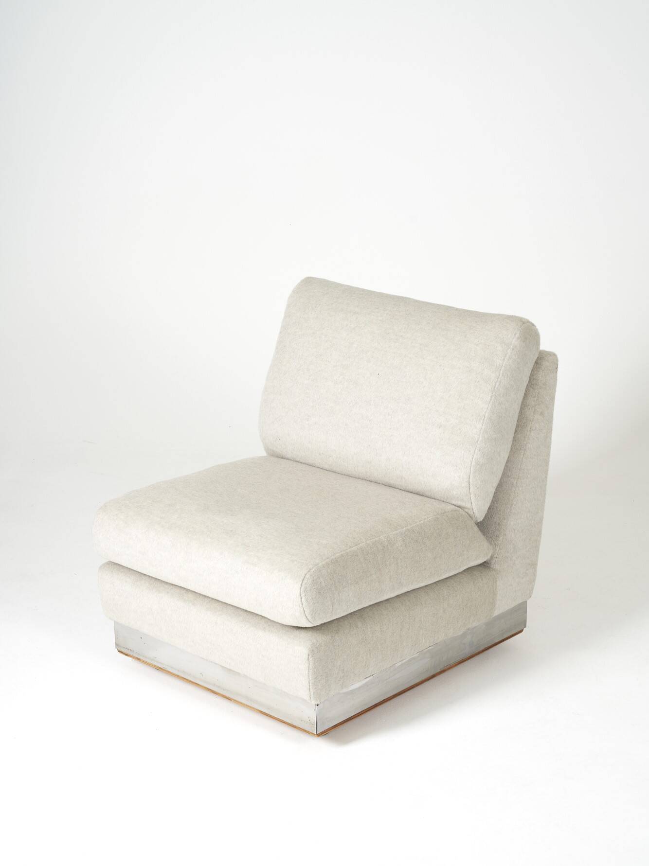 Beige fireside chair by Jacques Charpentier