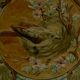 Slop bowl with bird decoration.