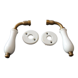 Set of two porcelain door handles with two rosettes