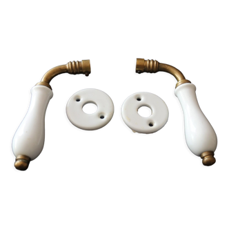 Set of two porcelain door handles with two rosettes