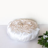 Old round cushion in white, beige pleated silk
