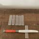 Vintage knife holders of 6, in glass