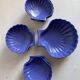 Shell-shaped ceramic service
