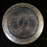 Old plate with pressed glass arabesque pie