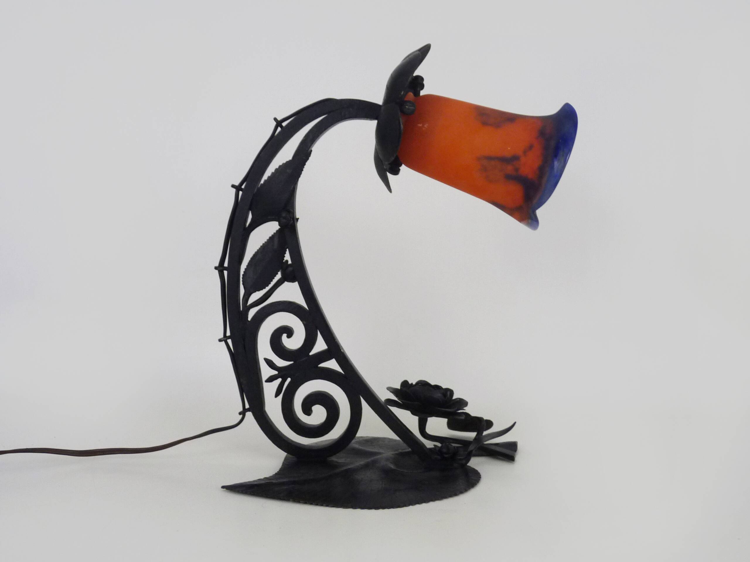 Art Deco Noverdy tulip lamp with black wrought iron base. 1930s