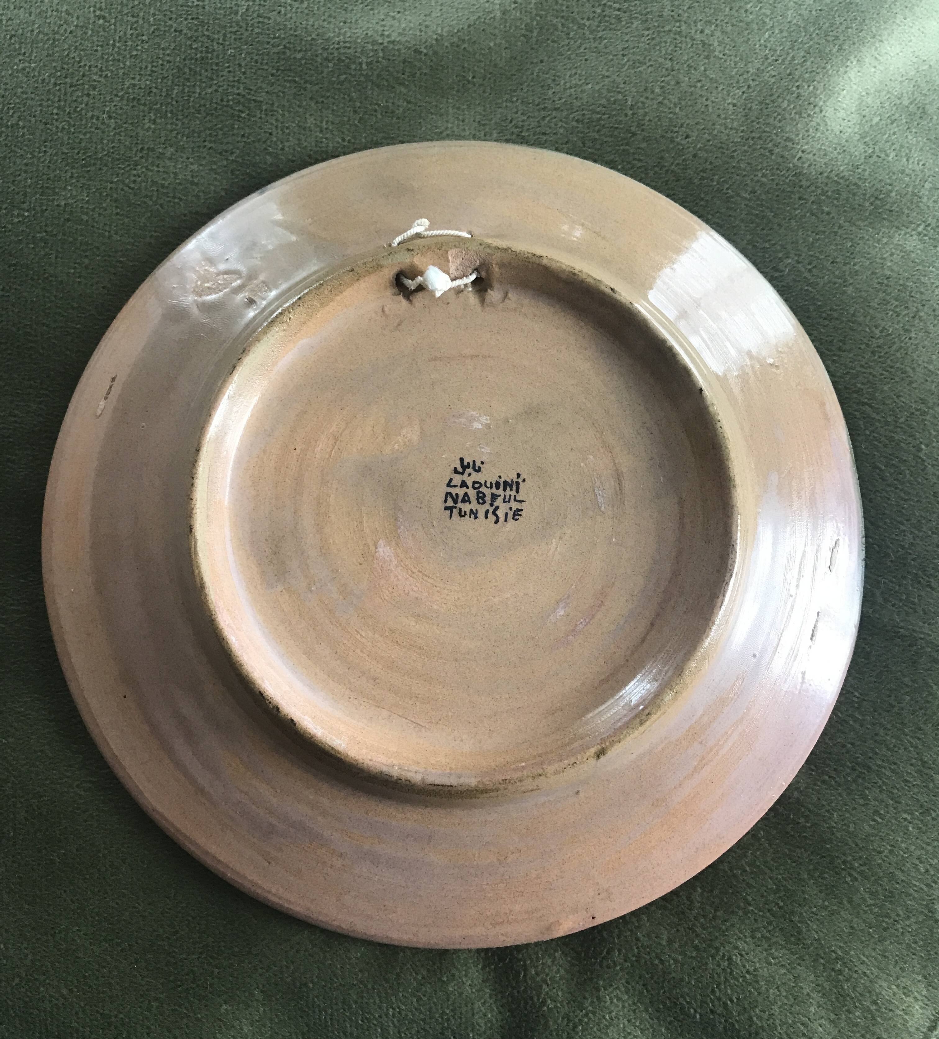 Small decorative chiseled ceramic plate