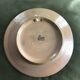Small decorative chiseled ceramic plate