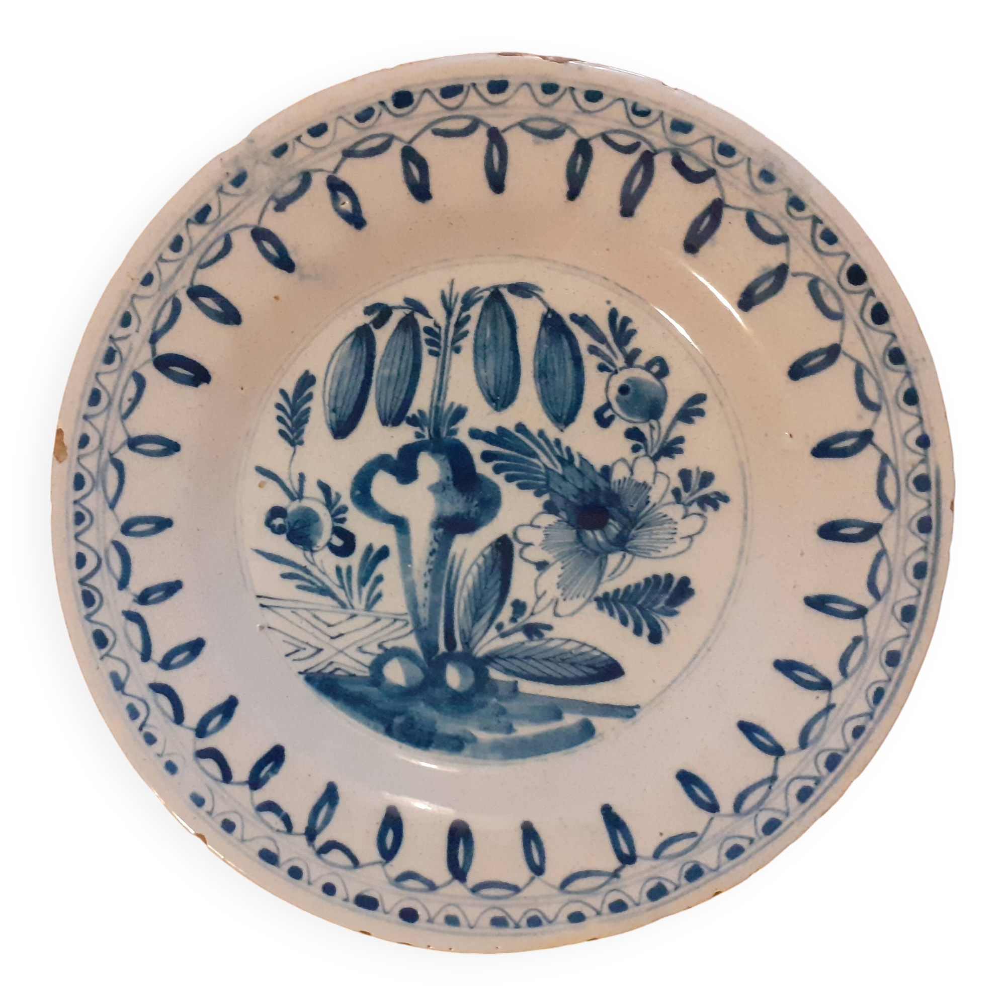 Old enamelled earthenware plate / Blue floral decoration