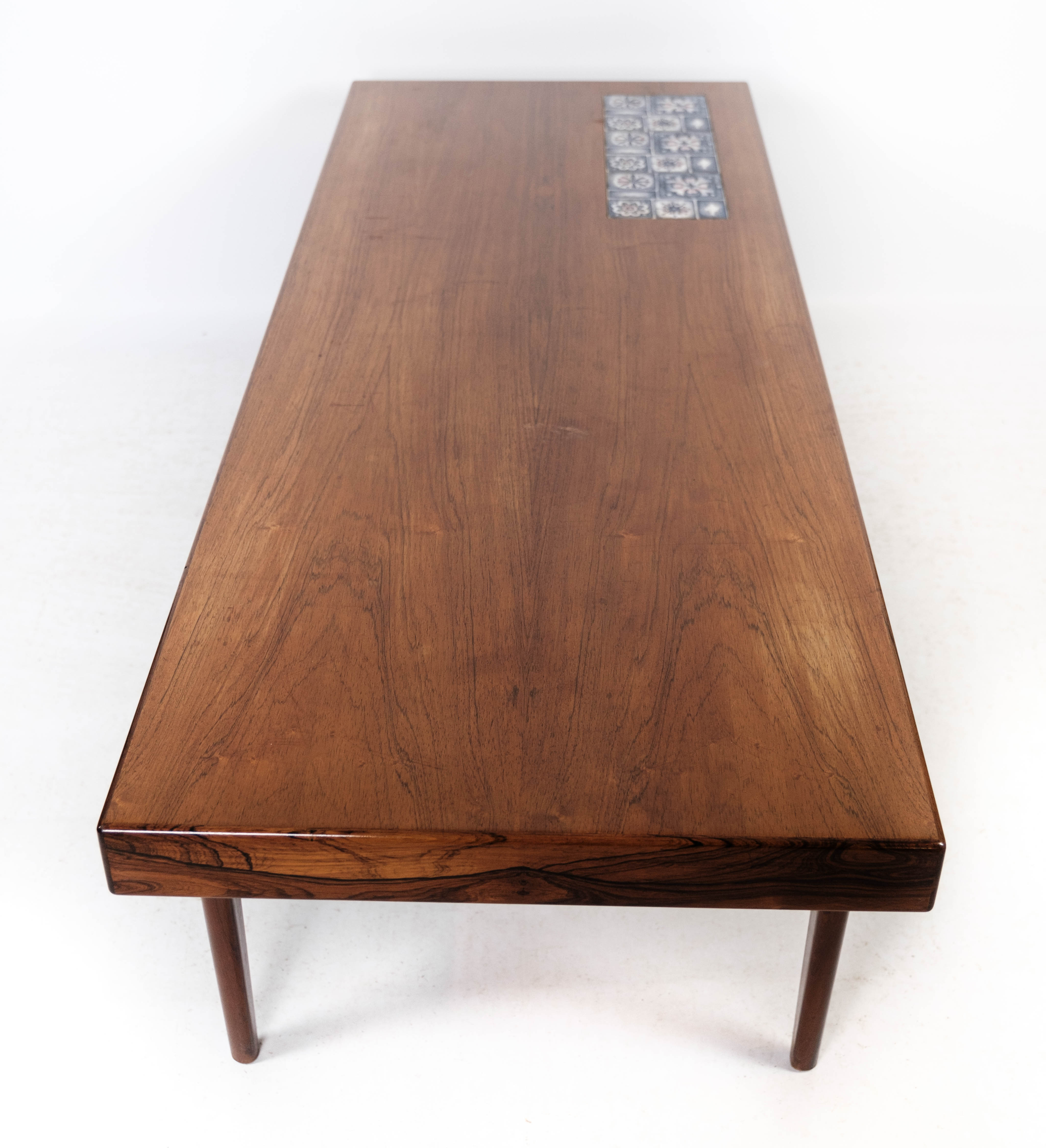 Coffee table in rosewood with blue tiles designed by Johannes Andersen, 1960s
