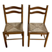 Pair of wooden and straw chairs in very good condition.