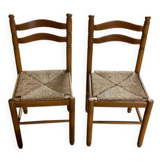 Pair of wooden and straw chairs in very good condition.