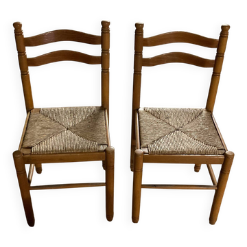 Pair of wooden and straw chairs in very good condition.