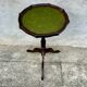 Small antique wooden and leather pedestal table, vintage wine side table