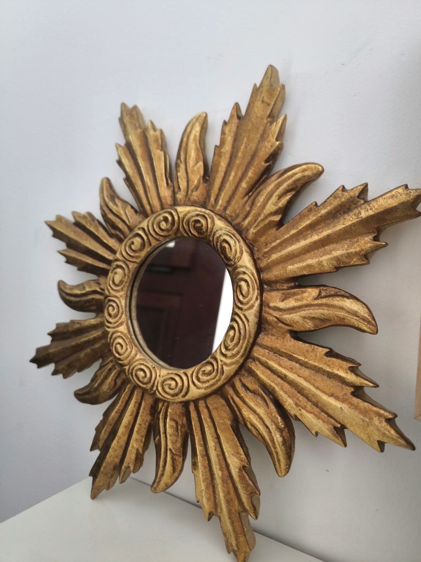 Miroir soleil doré