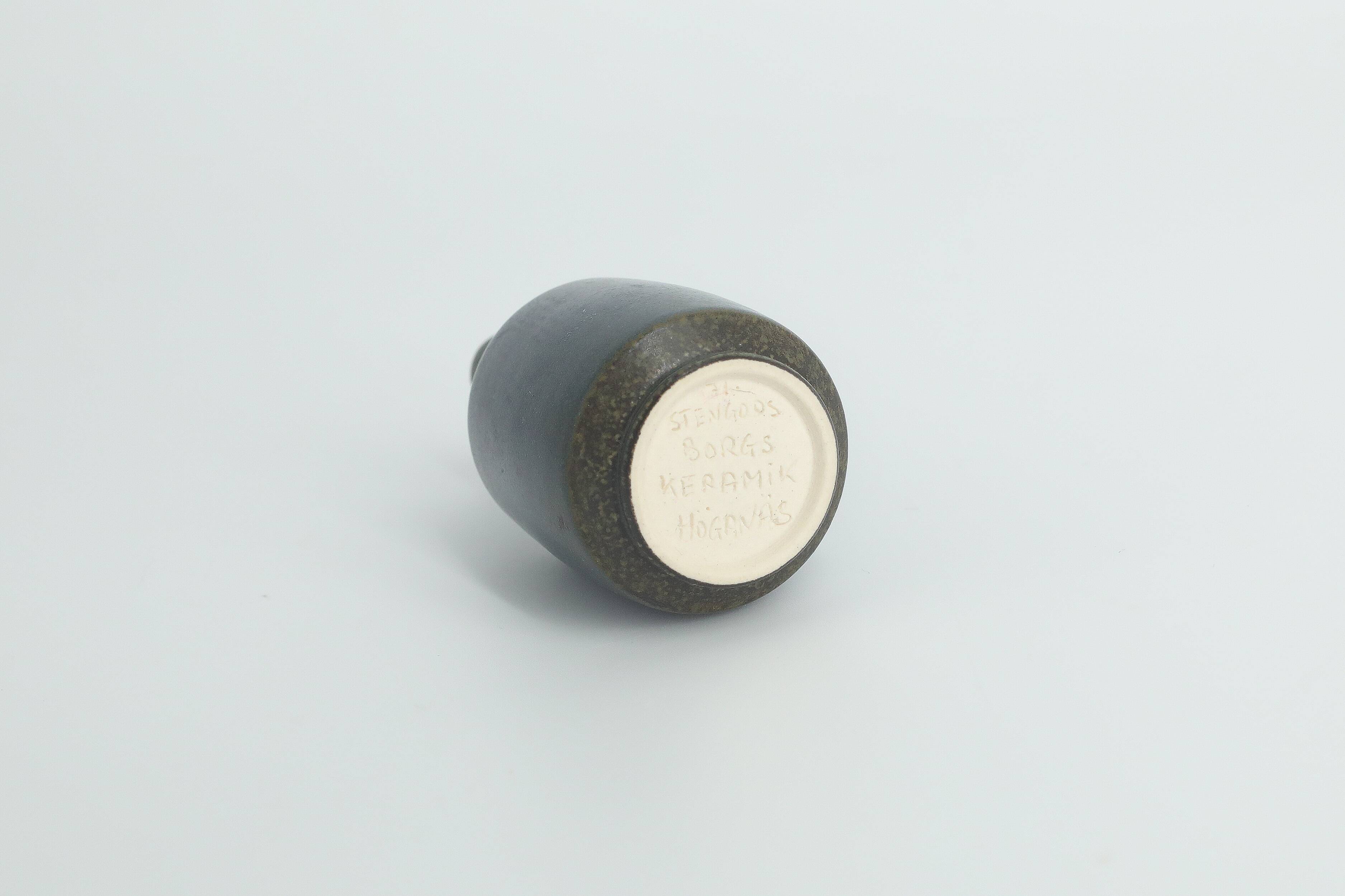 Set of 4 Mid-Century Scandinavian collectible vases in blue and brown stoneware by Gunnar Borg.