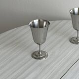 Two metal cups