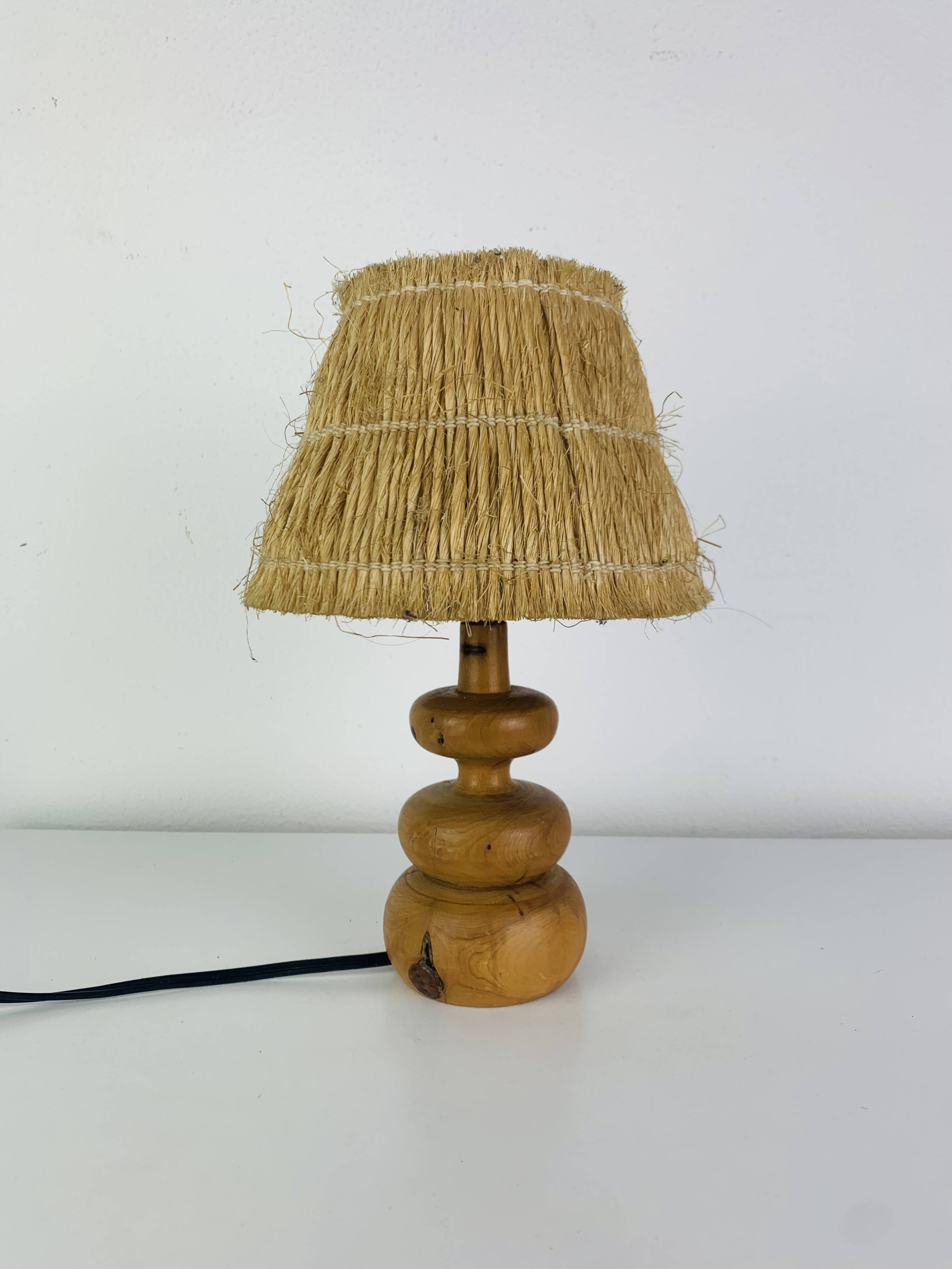 Turned wood lamp with straw shade, 1960s, vintage