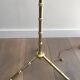 Floor lamp in faux-bamboo style, made of bronze and brass by Jacques Adnet