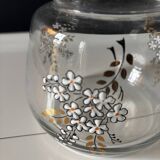 Vintage glass carafe with floral decoration