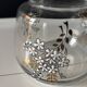 Vintage glass carafe with floral decoration