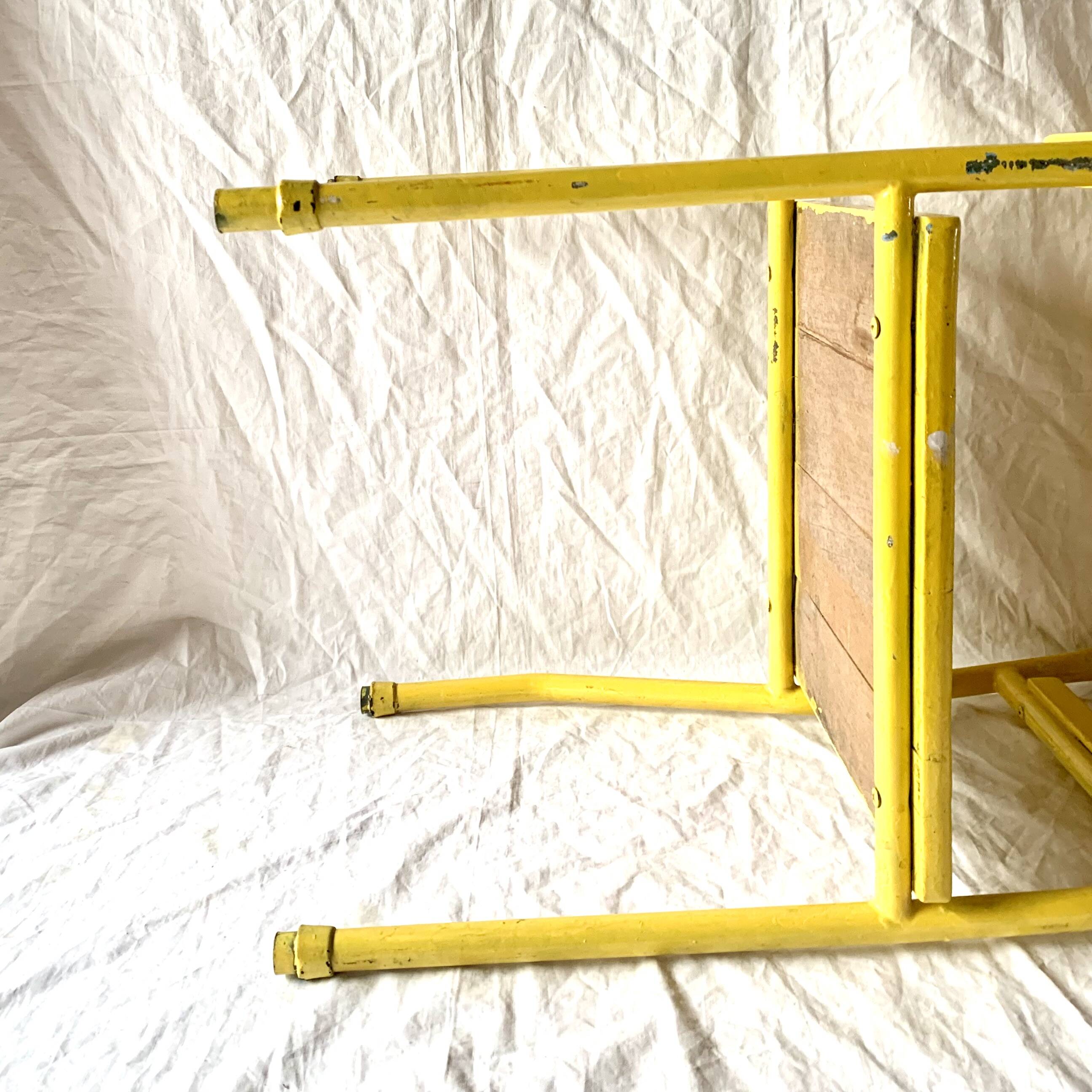 Vintage children's chair in yellow painted wood and metal