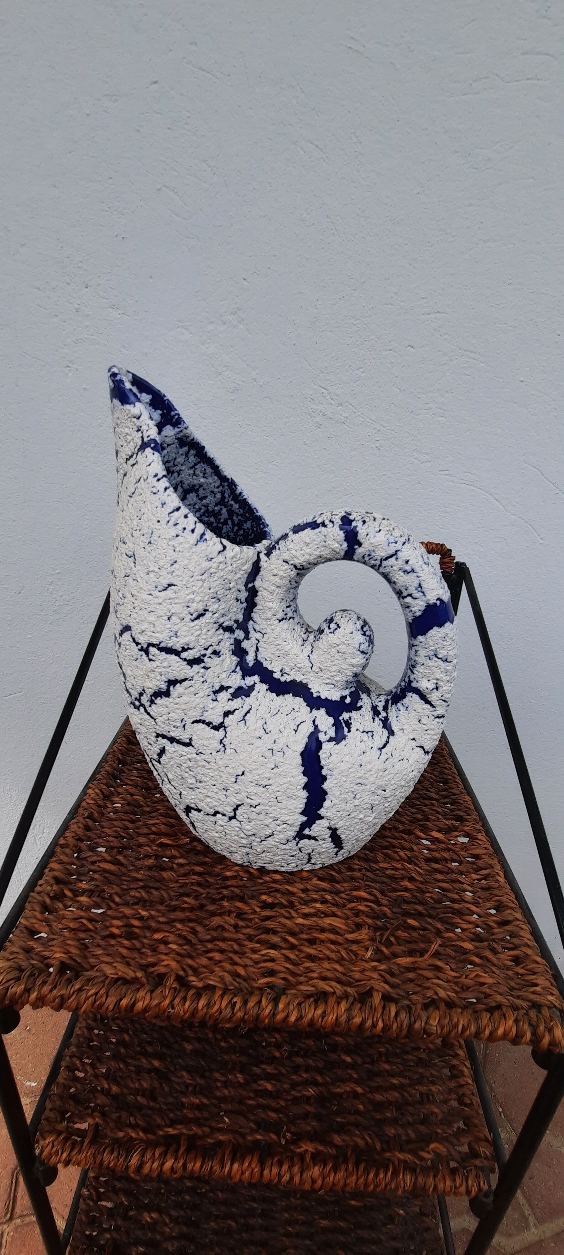Blue and white ceramic pitcher