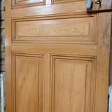 Old communication door with wood effect paint