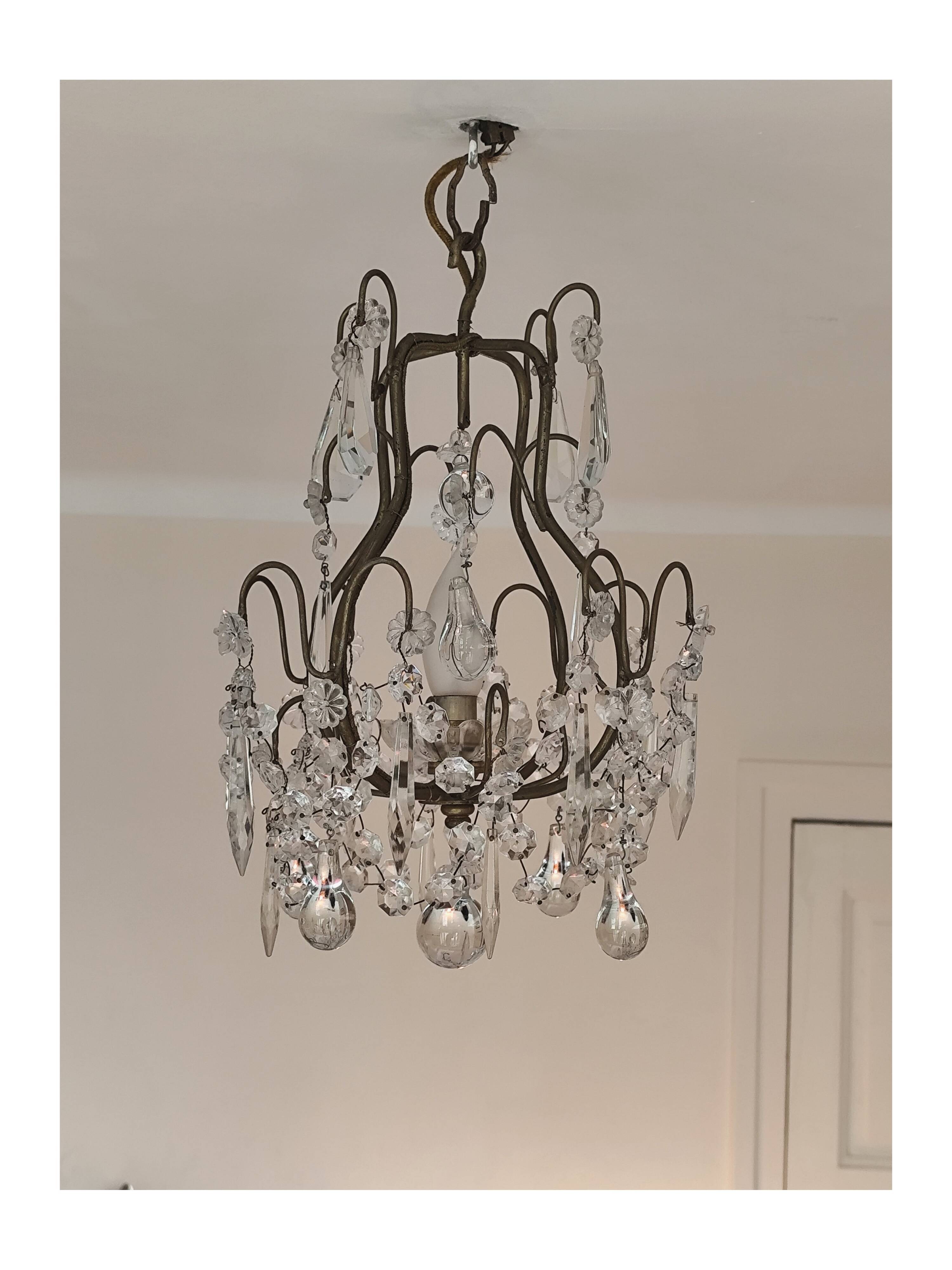 brass cage chandelier with crystal tassels
