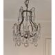 brass cage chandelier with crystal tassels