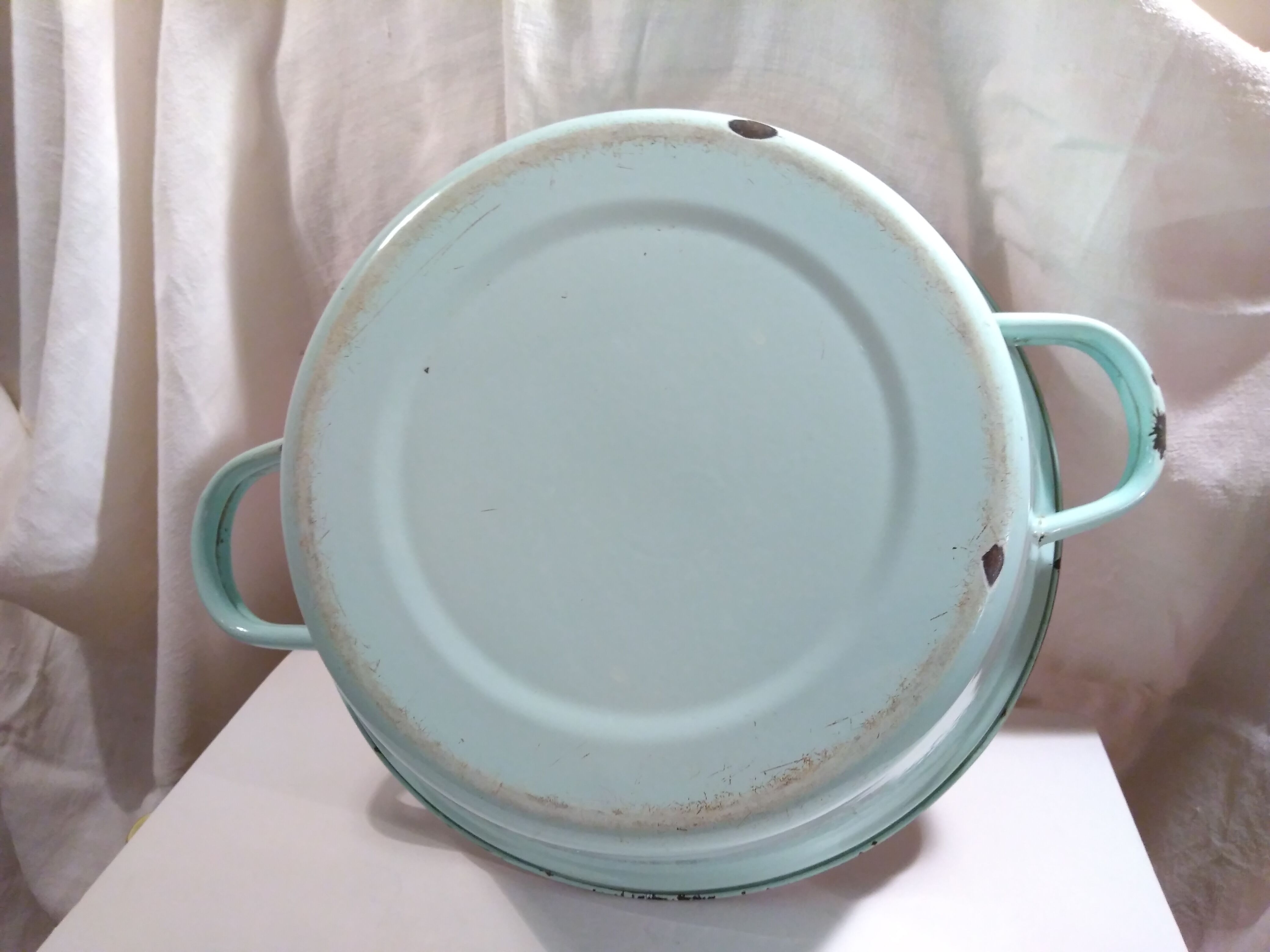 Ancient enamelled sheet metal basin