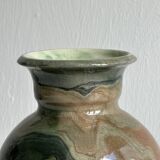 Signed ceramic vase.
