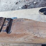 Oval table of grape harvesters from the Southwest in cherry wood