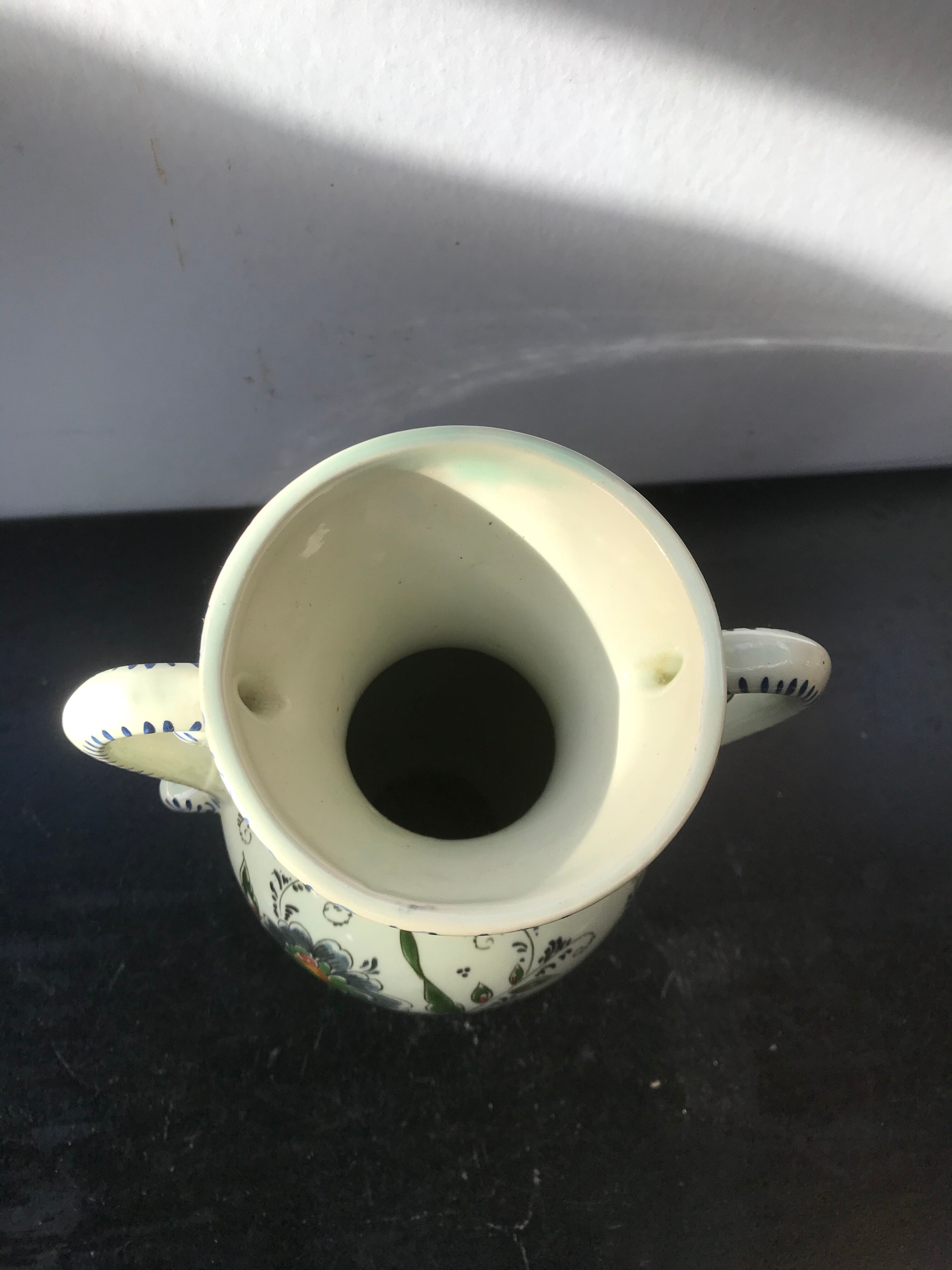 Ancient Delft vase with white ceramics decor vintage flowers