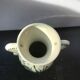 Ancient Delft vase with white ceramics decor vintage flowers