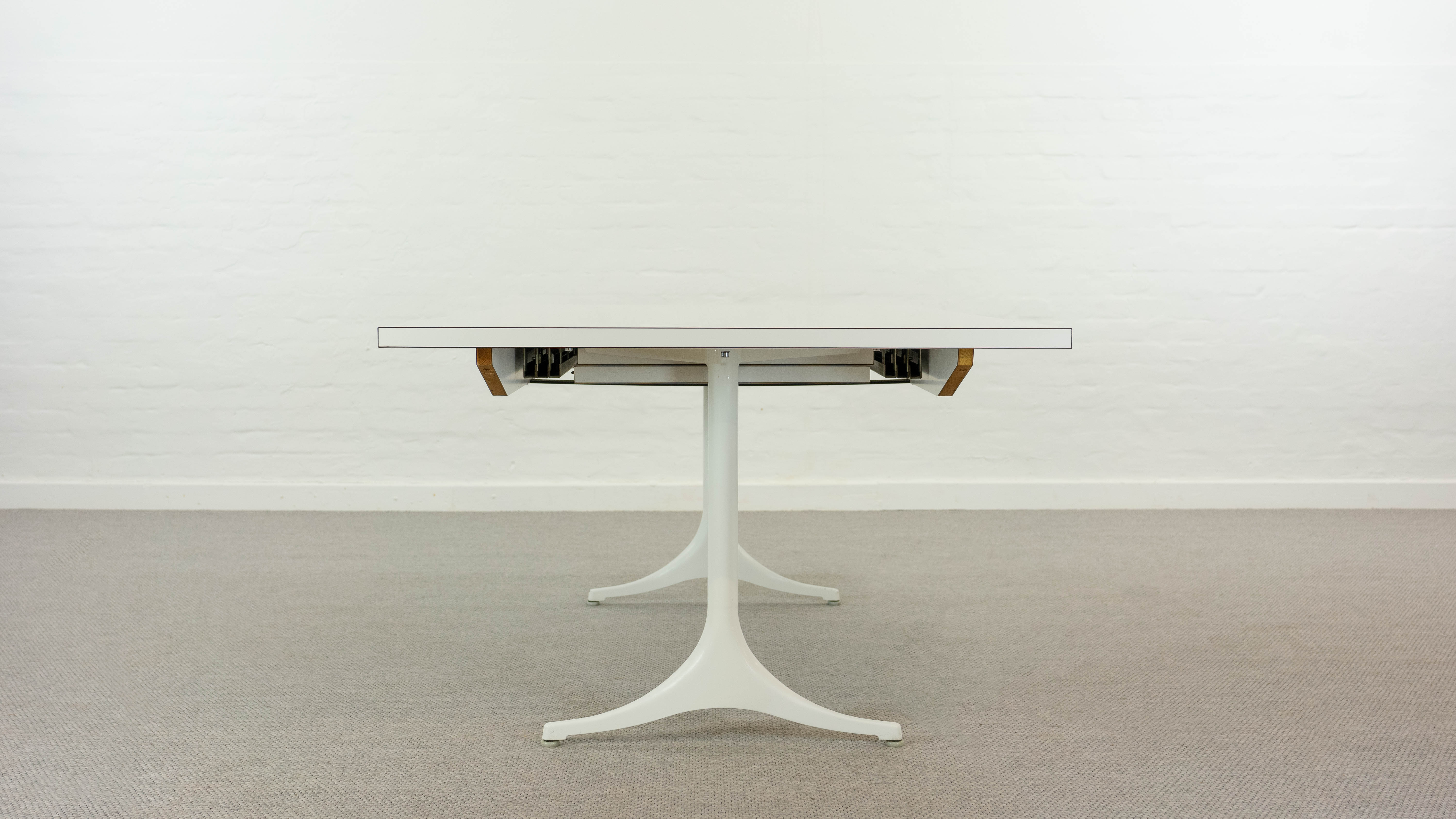 Extendable pedestal dining table by George Nelson for Herman Miller