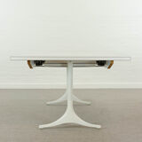 Extendable pedestal dining table by George Nelson for Herman Miller