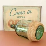 Bonbonne vintage en verre et raphia