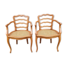 Paire de fauteuils canné bois blond années 60