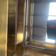 1970s brass bar with a mirrored front from the 20th century.