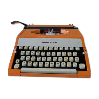 Machine a ecrire Typewriter Madi 2000 en métal orange vintage 1970 dans sa mallette d origine en plastique