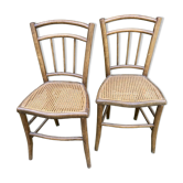 Two caned bistro chairs