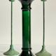 Green glass and metal candle holders