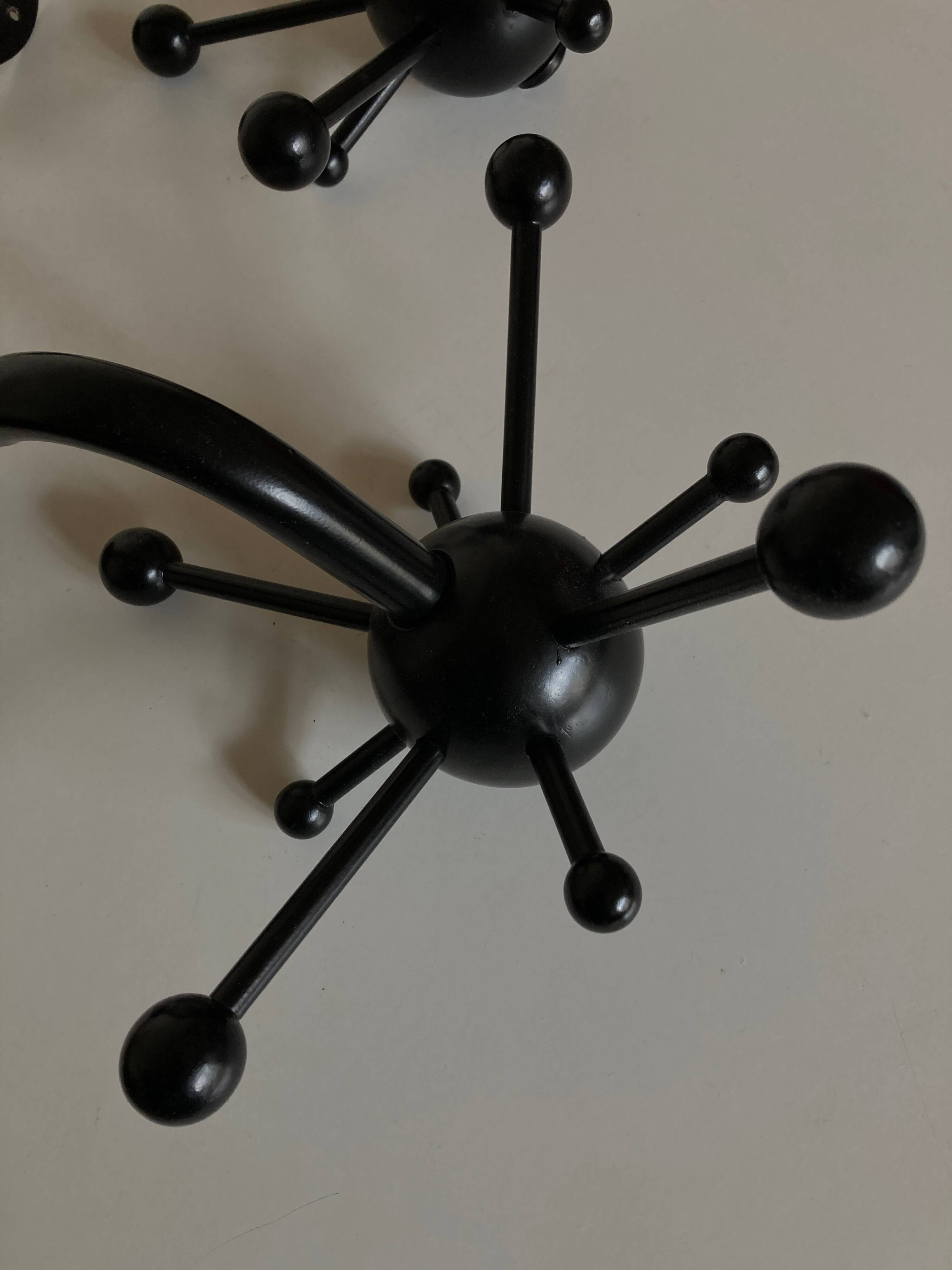 Pair of black space age sputnik coat racks