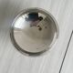 Small silver-plated metal bowl on a stand.