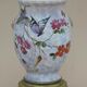 Vase en faïence décor papillon